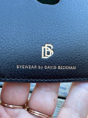 Black Leather Toiletry Pouch with Gold Logo